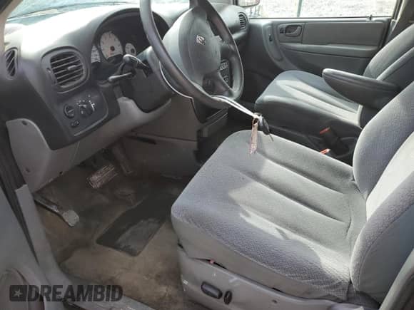2005 Dodge Caravan SXT with VIN 1D4GP45R75B341144, listed as a Copart auction lot 55465635 with 207,657 mi miles and Salvage title. Bid and sale history available at DreamBid. Image 7.