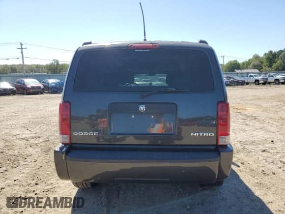 2011 Dodge Nitro Heat z VIN 1D4PT4GK5BW589795, wystawiony jako Copart lot #70257423 z przebiegiem 140 599 mil mil oraz Szkoda całkowita • Salvage title. Historia ofert i sprzedaży dostępna na DreamBid. Obrazek 6.