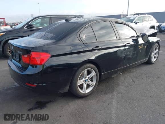 2015 BMW 3 Series 328i with VIN WBA3C1C52FK124086, listed as a IAAI auction lot 43295247 with 75,408 mi miles and . Bid and sale history available at DreamBid. Image 4.