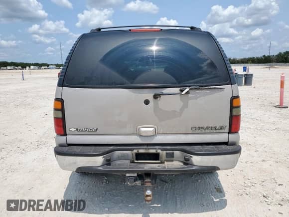 2005 Chevrolet Tahoe LS с VIN 1GNEC13T65J196009, выставлен на аукционе Copart как лот 66824185 с пробегом 329 689 миль миль и Списание • Salvage title. История ставок и продаж доступна на DreamBid. Изображение 6.