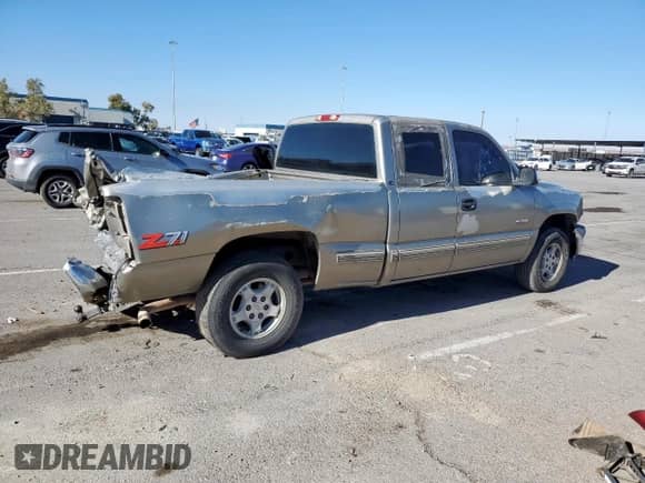 1999 Chevrolet Silverado 1500 LS z VIN 1GCEK19V8XE216342, wystawiony jako Copart lot #80629585 z przebiegiem 163 938 mil mil oraz Szkoda całkowita • Salvage title. Historia ofert i sprzedaży dostępna na DreamBid. Obrazek 3.