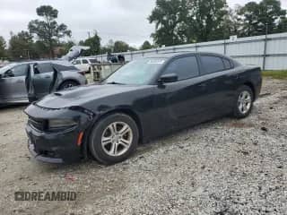 2016 Dodge Charger SE z VIN 2C3CDXBG0GH121285, wystawiony jako Copart lot #86305225 z przebiegiem 153 932 mil mil oraz Czysty tytuł • Clean title. Historia ofert i sprzedaży dostępna na DreamBid. Obrazek 1.