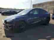 2023 Tesla Model Y Long Range с VIN 7SAYGDEE5PF910400, выставлен на аукционе Copart как лот 66009544 с пробегом 5 117 миль миль и Списание • Salvage title. История ставок и продаж доступна на DreamBid. Изображение 1.