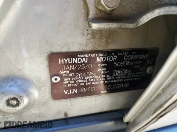 2002 Hyundai Santa Fe GLS z VIN KM8SC13D22U233146, wystawiony jako Copart lot #80273844 z przebiegiem 213 822 mil mil oraz Szkoda całkowita • Salvage title. Historia ofert i sprzedaży dostępna na DreamBid. Obrazek 14.