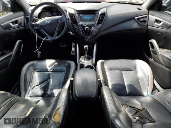 2013 Hyundai Veloster Turbo с VIN KMHTC6AE7DU173199, выставлен на аукционе Copart как лот 81507235 с пробегом 134 071 миль миль и Списание • Salvage title. История ставок и продаж доступна на DreamBid. Изображение 8.