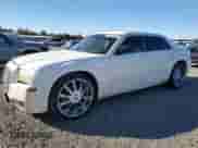 2006 Chrysler 300 with VIN 2C3KA43R46H388656, listed as a Copart auction lot 82635565 with 309,784 mi miles and Salvage title. Bid and sale history available at DreamBid. Image 1.