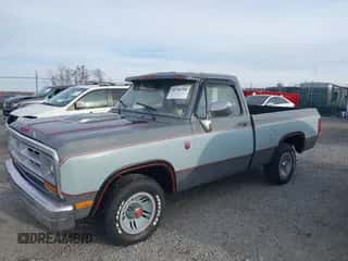 1988 Dodge D/W 100 with VIN 1B7FD04X9JS676023, listed as a IAAI auction lot 40746708 with 98,215 mi miles and . Bid and sale history available at DreamBid. Image 2.