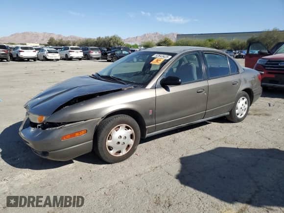 2000 Saturn SL with VIN 1G8ZH5289YZ145605, listed as a Copart auction lot 52643425 with Not provided miles and Salvage title. Bid and sale history available at DreamBid. Image 1.