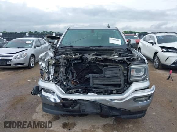 2018 GMC Sierra 1500 SLT z VIN 3GTP1NEC2JG323359, wystawiony jako IAAI lot #42483818 z przebiegiem 111 800 mil mil oraz . Historia ofert i sprzedaży dostępna na DreamBid. Obrazek 12.