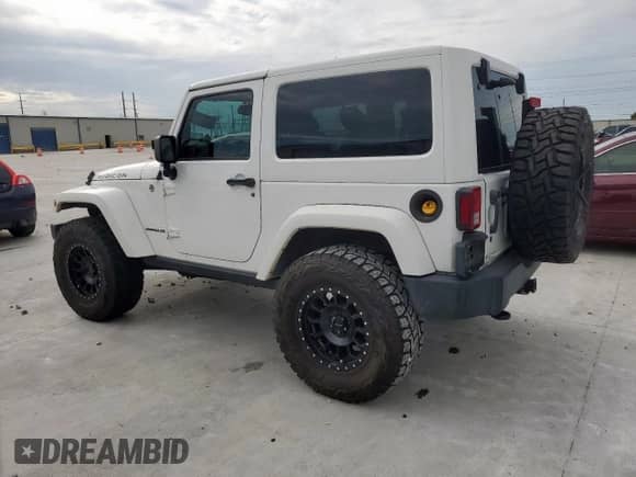 2013 Jeep Wrangler Rubicon 10th Anniversary with VIN 1C4BJWCGXDL550313, listed as a Copart auction lot 60374715 with 122,936 mi miles and Clean title. Bid and sale history available at DreamBid. Image 2.