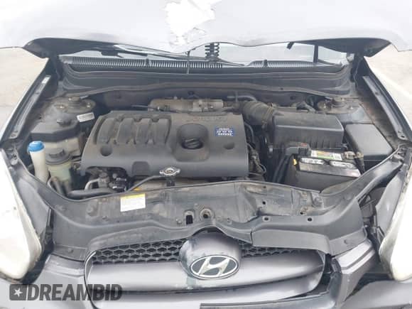 2010 Hyundai Accent Blue z VIN KMHCM3AC1AU158686, wystawiony jako IAAI lot #41466819 z przebiegiem 142 241 mil mil oraz . Historia ofert i sprzedaży dostępna na DreamBid. Obrazek 10.