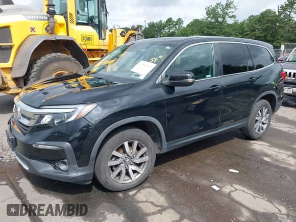 2019 Honda Pilot EX-L z VIN 5FNYF6H5XKB022919, wystawiony jako IAAI lot #42556473 z przebiegiem 77 238 mil mil oraz . Historia ofert i sprzedaży dostępna na DreamBid. Obrazek 2.