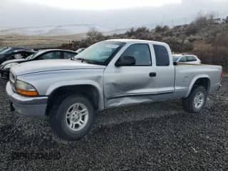 2003 Dodge Dakota с VIN 1D7GG42N53S239701, выставлен на аукционе Copart как лот 46103105 с пробегом Не указан миль и Списание • Salvage title. История ставок и продаж доступна на DreamBid. Изображение 1.
