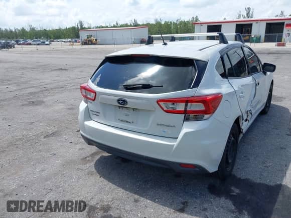 2018 Subaru Impreza with VIN 4S3GTAA65J3701017, listed as a IAAI auction lot 42827533 with 109,708 mi miles and . Bid and sale history available at DreamBid. Image 4.