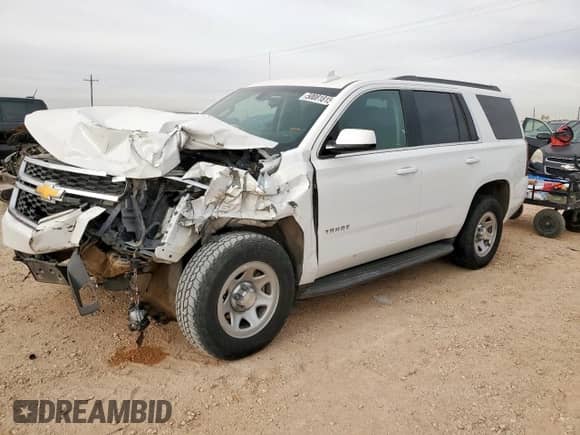 2018 Chevrolet Tahoe LS with VIN 1GNSKAKC4JR149743, listed as a Copart auction lot 50081815 with 52,005 mi miles and Salvage title. Bid and sale history available at DreamBid. Image 1.