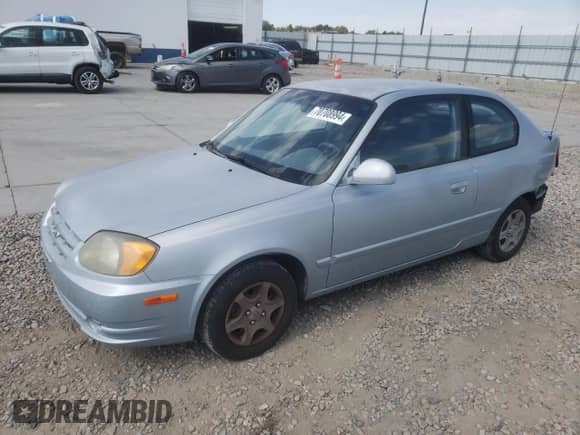 2005 Hyundai Accent GLS z VIN KMHCG35C55U341192, wystawiony jako Copart lot #70708994 z przebiegiem 174 872 mil mil oraz Szkoda całkowita • Salvage title. Historia ofert i sprzedaży dostępna na DreamBid. Obrazek 1.