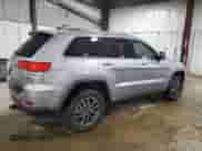 2017 Jeep Grand Cherokee Laredo with VIN 1C4RJFAG4HC811085, listed as a Copart auction lot 81564095 with 136,410 mi miles and Salvage title. Bid and sale history available at DreamBid. Image 3.