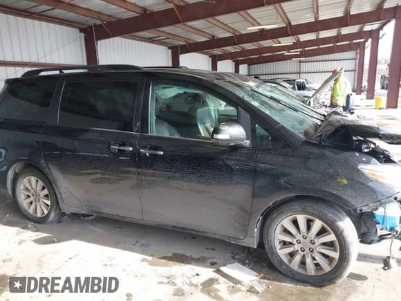 2015 Toyota Sienna Limited with VIN 5TDDK3DC6FS122871, listed as a IAAI auction lot 41396052 with 133,161 mi miles and . Bid and sale history available at DreamBid. Image 13.