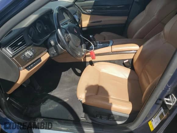 2012 BMW 7 Series с VIN WBAKX6C58CC197207, выставлен на аукционе Copart как лот 84153784 с пробегом 130 049 миль миль и Списание • Salvage title. История ставок и продаж доступна на DreamBid. Изображение 7.