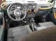 2012 Jeep Wrangler Sport с VIN 1C4AJWAG6CL267694, выставлен на аукционе Copart как лот 63449144 с пробегом 86 642 миль миль и Списание • Salvage title. История ставок и продаж доступна на DreamBid. Изображение 8.