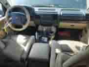 2004 Land Rover Discovery SE с VIN SALTY19494A838019, выставлен на аукционе Copart как лот 82629745 с пробегом 153 427 миль миль и Чистый • Clean title. История ставок и продаж доступна на DreamBid. Изображение 8.