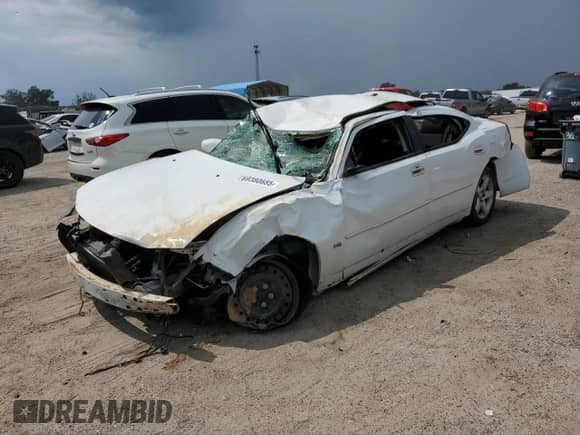 2010 Dodge Charger SXT с VIN 2B3CA3CV2AH310071, выставлен на аукционе Copart как лот 69380685 с пробегом 247 898 миль миль и Чистый • Clean title. История ставок и продаж доступна на DreamBid. Изображение 1.