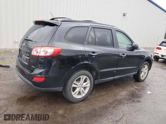 2012 Hyundai Santa Fe Limited z VIN 5XYZK4AG3CG105232, wystawiony jako Copart lot #86105465 z przebiegiem 198 251 mil mil oraz Szkoda całkowita • Salvage title. Historia ofert i sprzedaży dostępna na DreamBid. Obrazek 3.