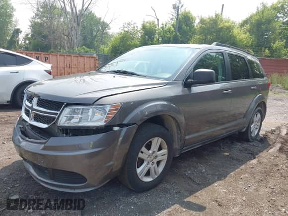 2012 Dodge Journey SE z VIN 3C4PDCAB2CT391342, wystawiony jako IAAI lot #42456242 z przebiegiem 93 102 mil mil oraz . Historia ofert i sprzedaży dostępna na DreamBid. Obrazek 2.