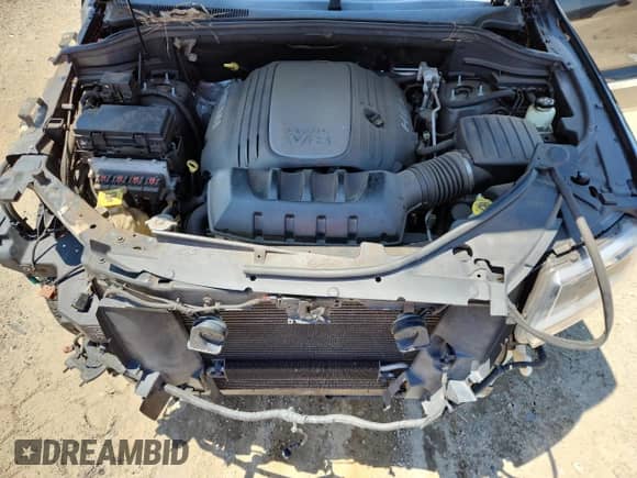 2012 Jeep Grand Cherokee Overland with VIN 1C4RJFCT9CC346497, listed as a Copart auction lot 63004635 with 142,623 mi miles and Salvage title. Bid and sale history available at DreamBid. Image 12.