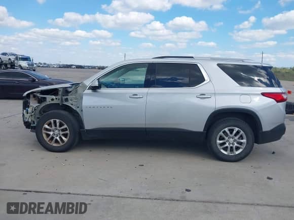 2018 Chevrolet Traverse LT Cloth with VIN 1GNERGKW7JJ224858, listed as a IAAI auction lot 43434637 with 77,365 mi miles and . Bid and sale history available at DreamBid. Image 14.