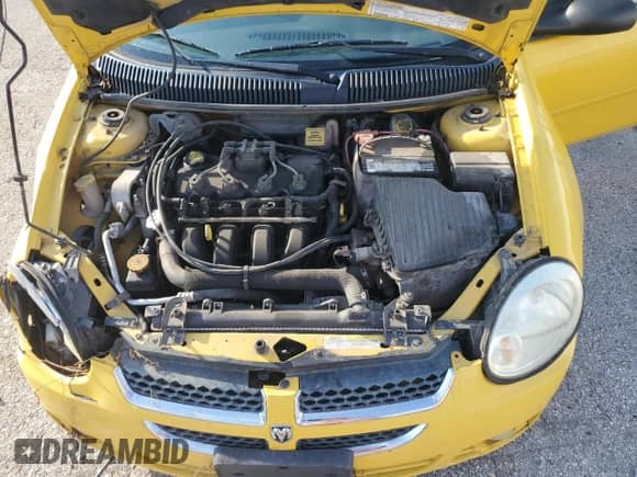 2004 Dodge Neon SXT with VIN 1B3ES56C14D505673, listed as a Copart auction lot 69035765 with 168,814 mi miles and Salvage title. Bid and sale history available at DreamBid. Image 11.