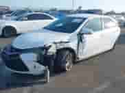 2016 Toyota Camry XLE with VIN 4T1BF1FK5GU136919, listed as a IAAI auction lot 43248056 with 97,053 mi miles and . Bid and sale history available at DreamBid. Image 2.