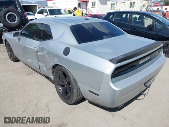 2012 Dodge Challenger R/T z VIN 2C3CDYBT6CH144809, wystawiony jako IAAI lot #41958418 z przebiegiem 107 038 mil mil oraz . Historia ofert i sprzedaży dostępna na DreamBid. Obrazek 3.