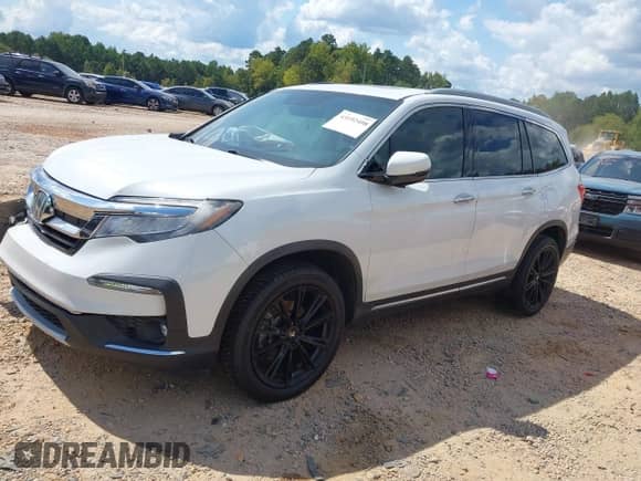 2020 Honda Pilot Elite с VIN 5FNYF6H03LB039860, выставлен на аукционе IAAI как лот 43192408 с пробегом 75 597 миль миль и . История ставок и продаж доступна на DreamBid. Изображение 2.