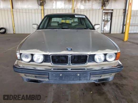 1993 BMW 7 Series с VIN WBAGD4320PDE61578, выставлен на аукционе Copart как лот 74251224 с пробегом Не указан миль и Списание • Salvage title. История ставок и продаж доступна на DreamBid. Изображение 5.