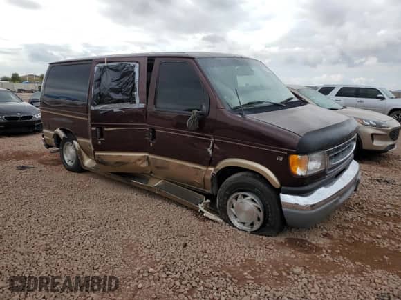 2000 Ford Econoline Cargo Recreational with VIN 1FDRE14LXYHA39870, listed as a Copart auction lot 41824065 with 112,028 mi miles and Salvage title. Bid and sale history available at DreamBid. Image 4.