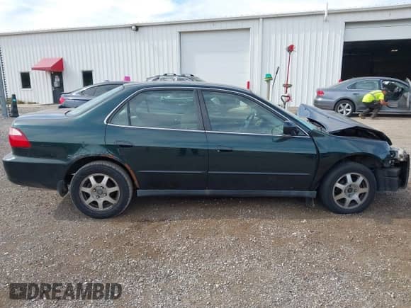 1999 Honda Accord LX с VIN JHMCG5640XC011104, выставлен на аукционе IAAI как лот 43345101 с пробегом 284 605 миль миль и . История ставок и продаж доступна на DreamBid. Изображение 13.