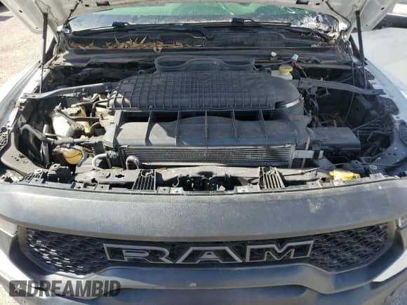 2022 Ram 1500 TRX z VIN 1C6SRFU99NN102201, wystawiony jako Copart lot #69654795 z przebiegiem Nie podano mil oraz Czysty tytuł • Clean title. Historia ofert i sprzedaży dostępna na DreamBid. Obrazek 11.