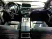 2017 BMW 7 Series 740i с VIN WBA7E2C38HG740803, выставлен на аукционе Copart как лот 81501205 с пробегом Не указан миль и Списание • Salvage title. История ставок и продаж доступна на DreamBid. Изображение 8.