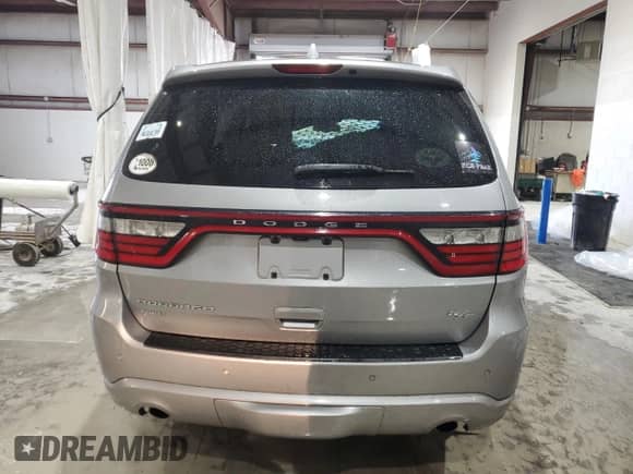 2016 Dodge Durango R/T with VIN 1C4SDJCT5GC341265, listed as a Copart auction lot 82257175 with 105,859 mi miles and Salvage title. Bid and sale history available at DreamBid. Image 6.
