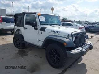 2015 Jeep Wrangler Willys Wheeler with VIN 1C4AJWAG0FL562536, listed as a IAAI auction lot 42384747 with 103,507 mi miles and . Bid and sale history available at DreamBid. Image 1.