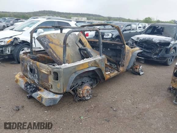 2013 Jeep Wrangler Sport with VIN 1C4AJWAG2DL626332, listed as a IAAI auction lot 41932708 with Not provided miles and . Bid and sale history available at DreamBid. Image 4.