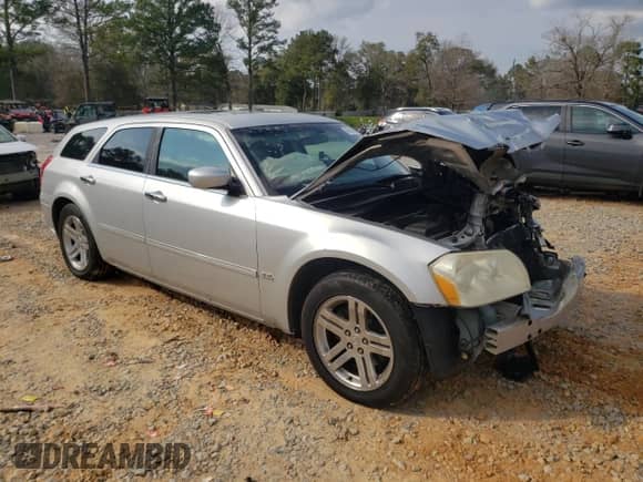 2006 Dodge Magnum with VIN 2D4FV47V76H124195, listed as a Copart auction lot 48734725 with 196,437 mi miles and Salvage title. Bid and sale history available at DreamBid. Image 4.