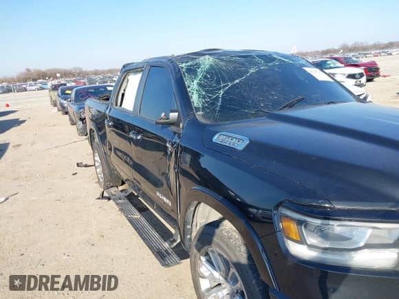 2021 Ram 1500 Laramie with VIN 1C6RREJT1MN710141, listed as a IAAI auction lot 41247763 with Not provided miles and . Bid and sale history available at DreamBid. Image 6.
