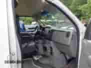 2012 Ford Econoline Cargo Commercial z VIN 1FTNS2EWXCDA09147, wystawiony jako IAAI lot #42418065 z przebiegiem 169 509 mil mil oraz . Historia ofert i sprzedaży dostępna na DreamBid. Obrazek 5.