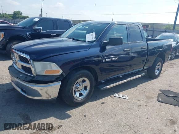 2012 Ram 1500 ST with VIN 1C6RD6FK1CS228130, listed as a IAAI auction lot 42397730 with 136,092 mi miles and . Bid and sale history available at DreamBid. Image 17.