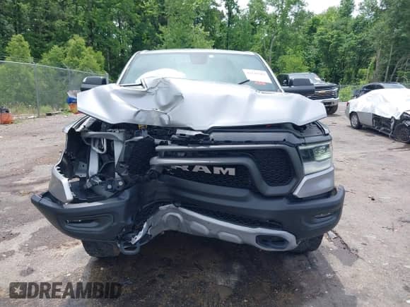 2020 Ram 1500 Rebel with VIN 1C6SRFLT8LN229872, listed as a IAAI auction lot 42135383 with 71,741 mi miles and . Bid and sale history available at DreamBid. Image 13.