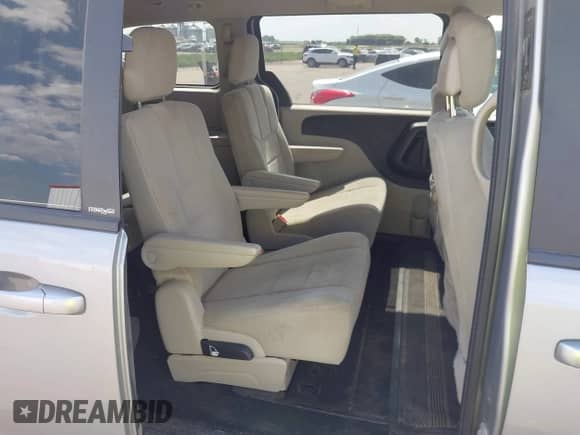 2013 Dodge Grand Caravan SXT with VIN 2C4RDGCG1DR602334, listed as a IAAI auction lot 42537139 with 214,688 mi miles and . Bid and sale history available at DreamBid. Image 8.
