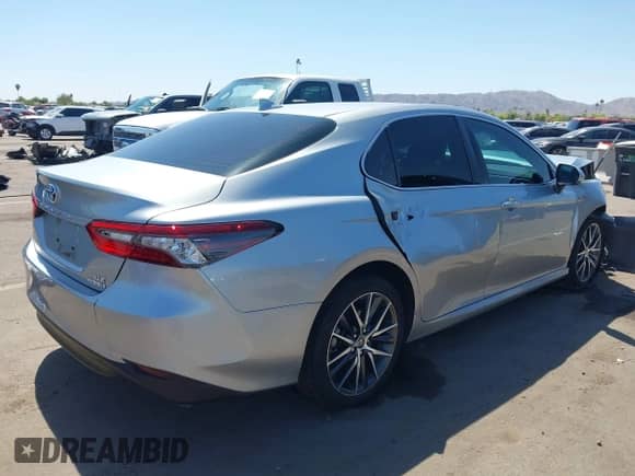 2021 Toyota Camry Hybrid XLE with VIN 4T1F31AK2MU547062, listed as a IAAI auction lot 42405027 with 170,899 mi miles and . Bid and sale history available at DreamBid. Image 4.