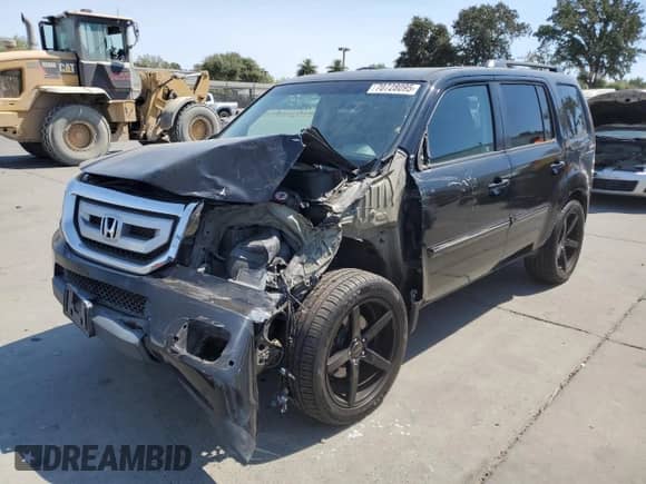 2011 Honda Pilot Touring with VIN 5FNYF3H9XBB041665, listed as a Copart auction lot 70728095 with 198,665 mi miles and Salvage title. Bid and sale history available at DreamBid. Image 1.